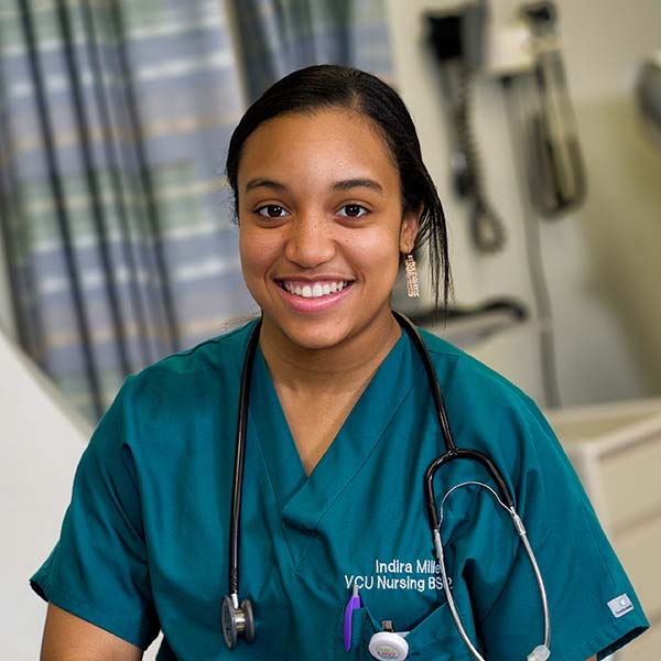 Female in scrubs with stethoscope
