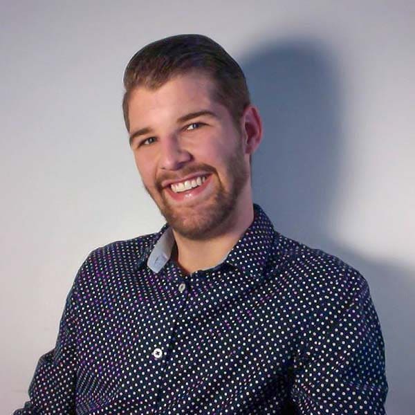 Man wearing polka dot shirt