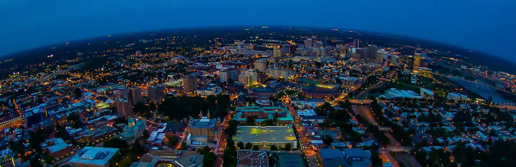 Nighttime aerial view of VCU campus and downtown Richmond